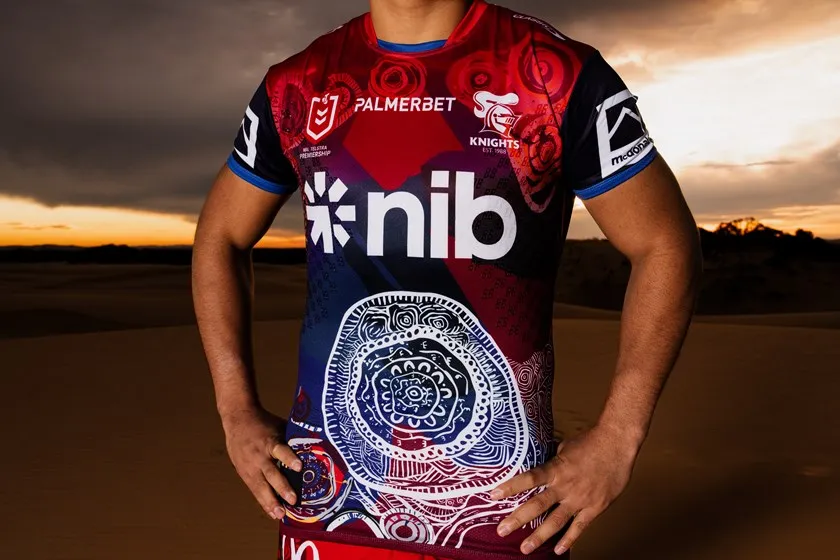 The Nginhabulagu artwork across the front of the jersey, close