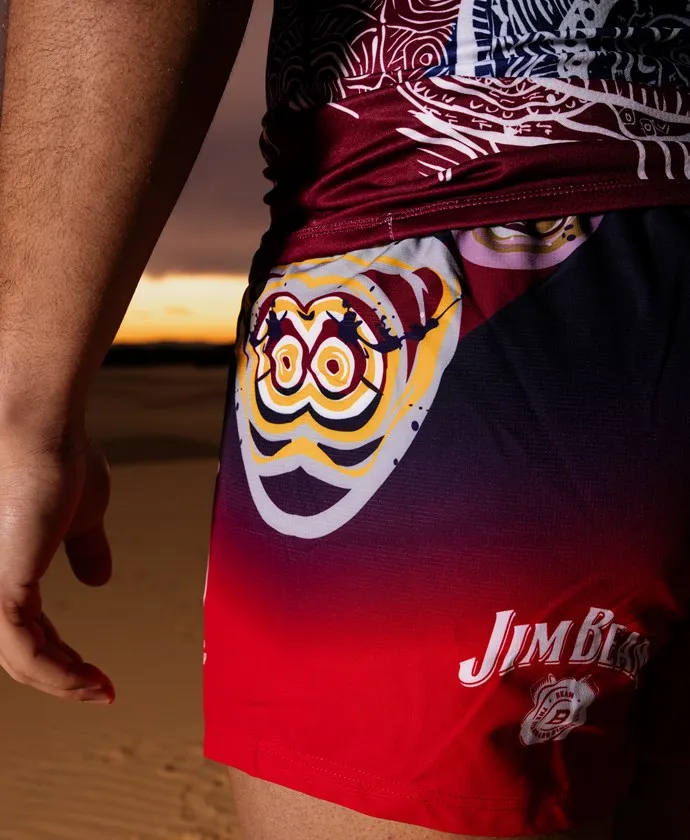 The gold and white motif on the leg of the Indigenous Round shorts