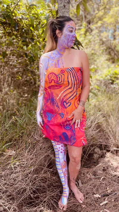 Garment detail — a Renae Lamb print in orange, pink and blue
