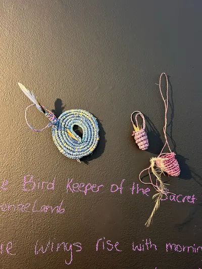 The Blue Bird Keeper wall, closer — Renae Lamb’s weaving and handwriting