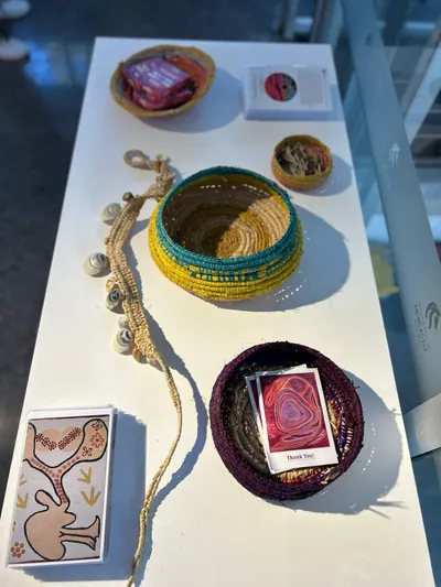 Woven vessels by Renae Lamb on the exhibition table