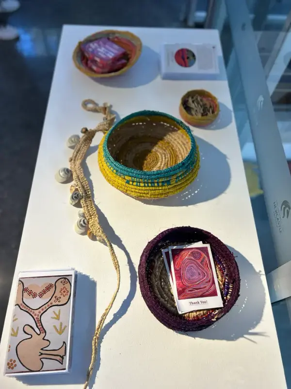 Woven vessels by Renae Lamb on the exhibition table