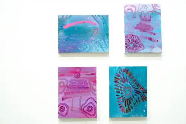 Painting by Renae Lamb, in detail — layered contour rings in blue and white