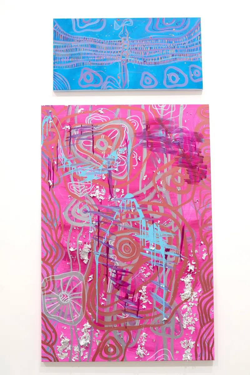 A hang of small framed works by Renae Lamb
