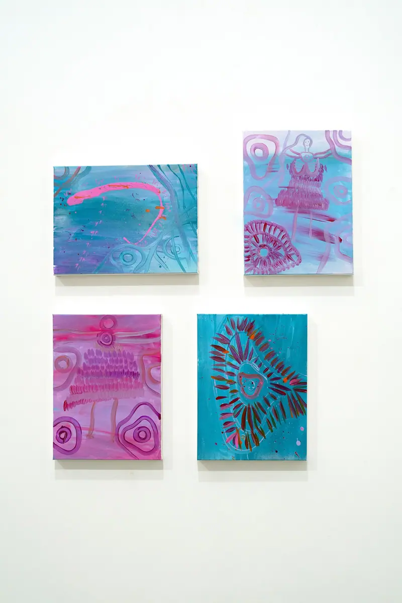 Three small paintings by Renae Lamb, hung as a group